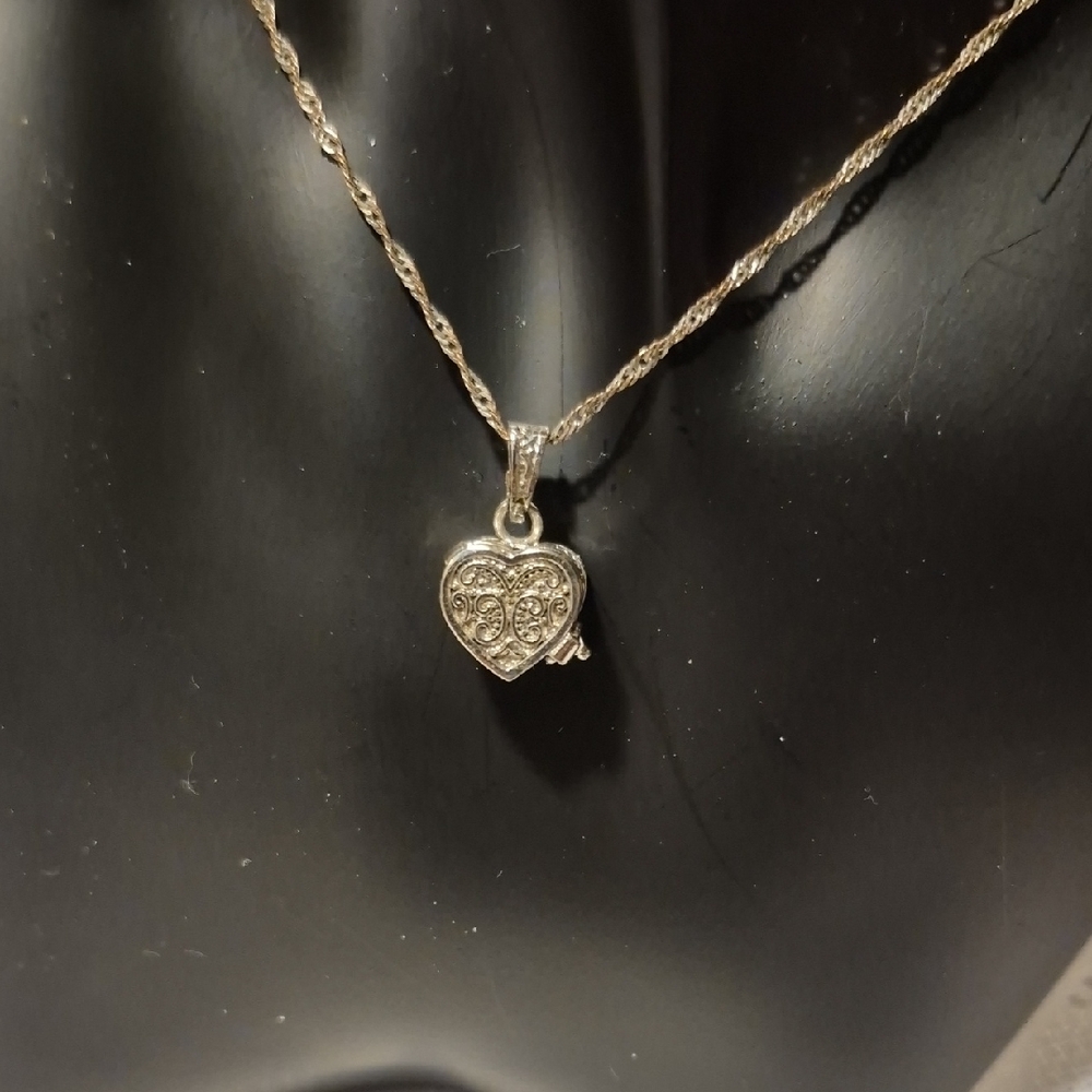 Intricate Silver Heart Pendant Necklace